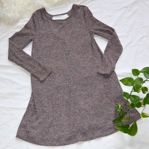 Open backed long sleeved dress